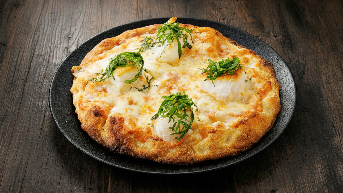 おもちとめんたいチーズ 880円（税込） たっぷり塗られた明太バターの上にこんがりチーズとお餅がとろ〜り